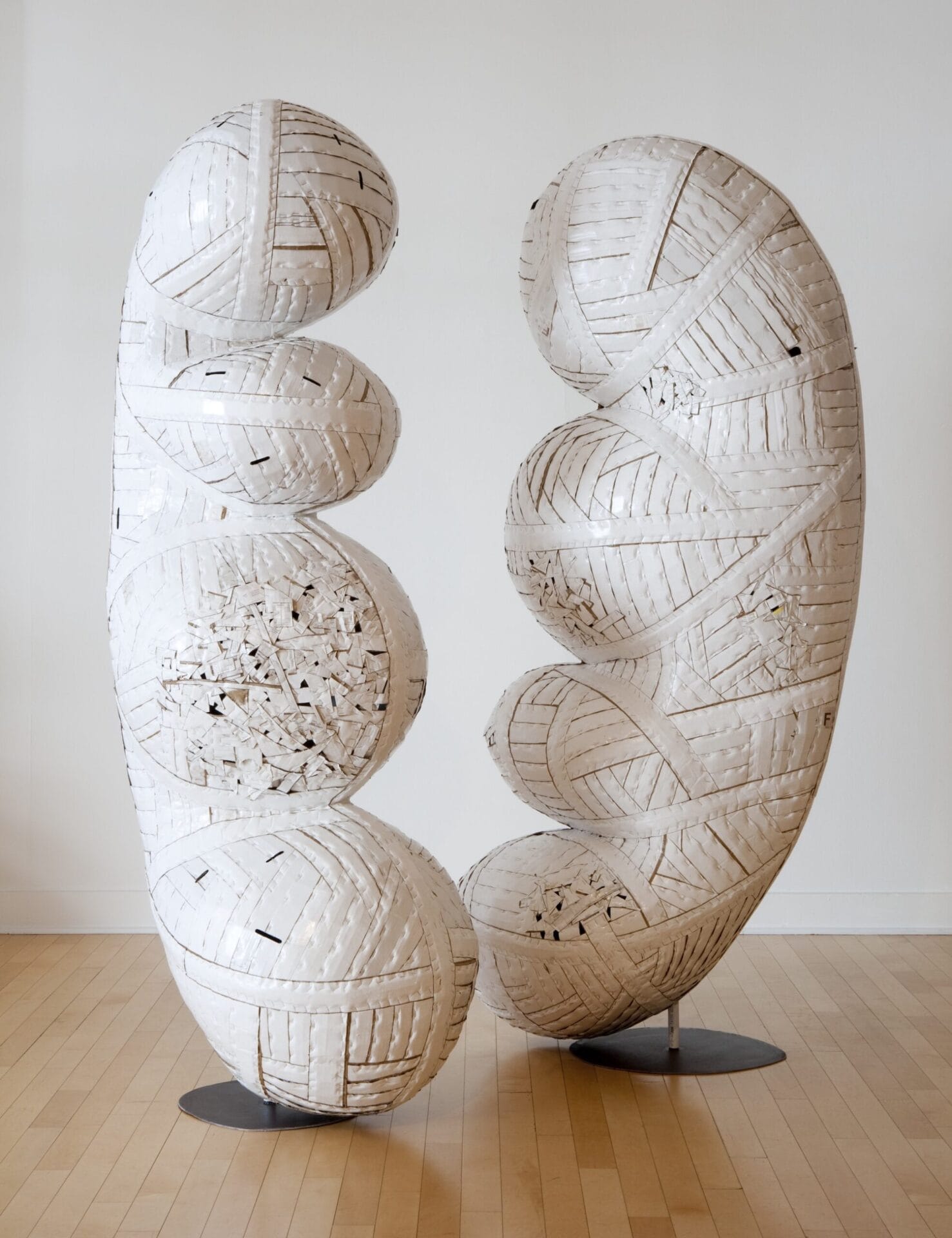 two large sculptures in white by Ann Weber