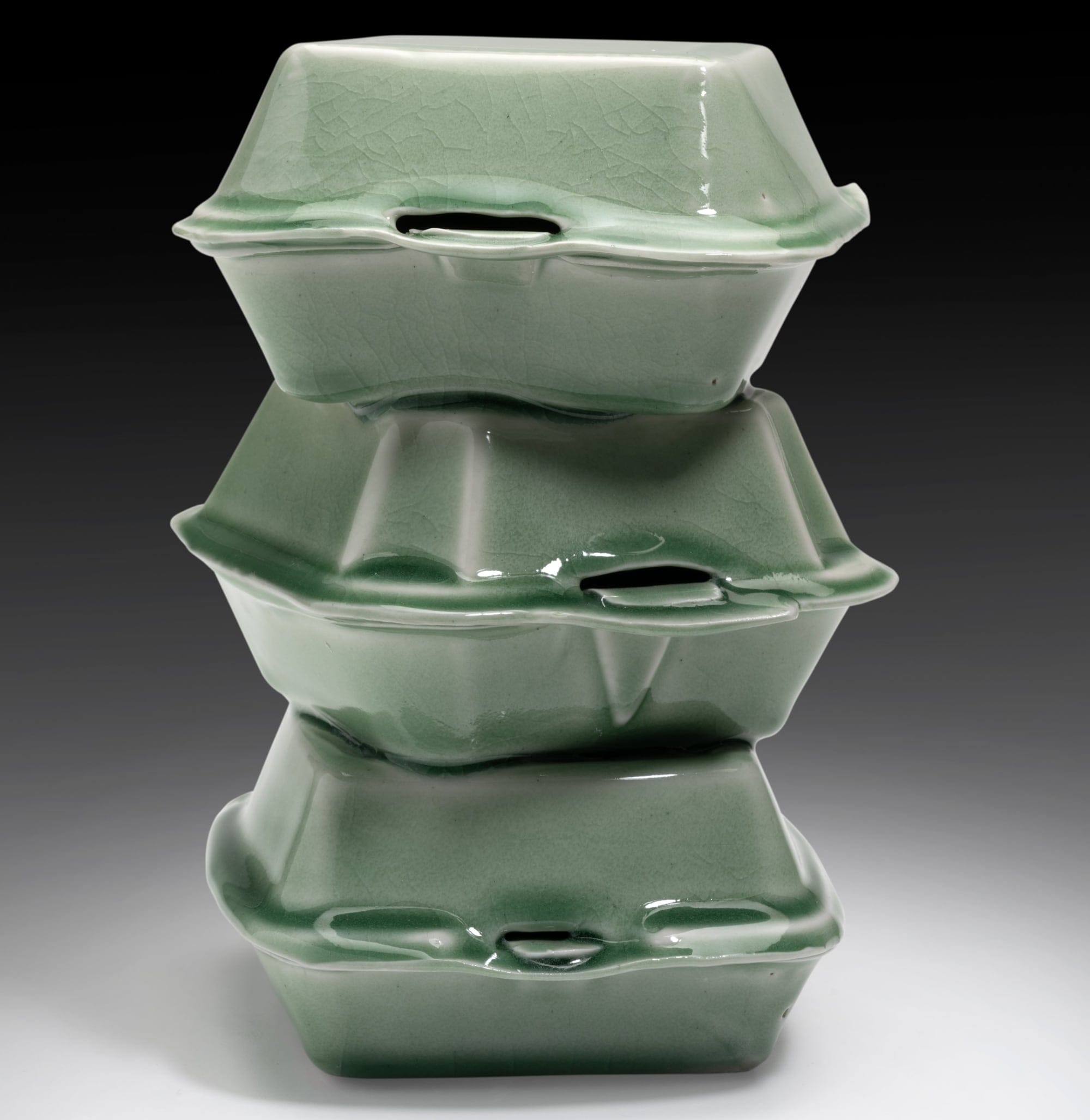 stacks of celadon takeout containers