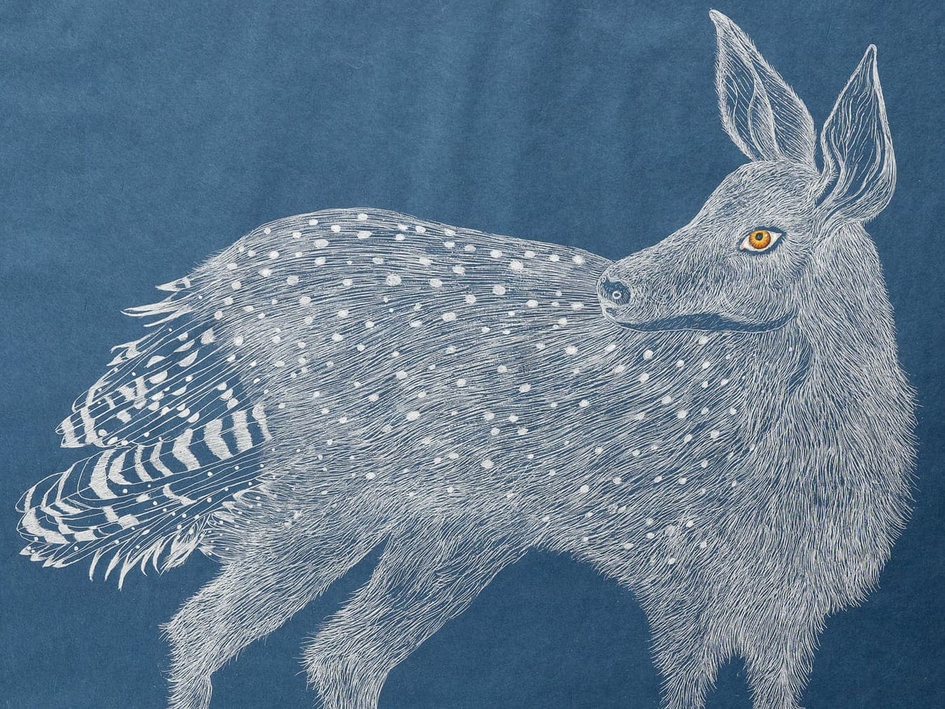 a drawing on an indigo blue watercolor background depicting a deer with feathers in white ink
