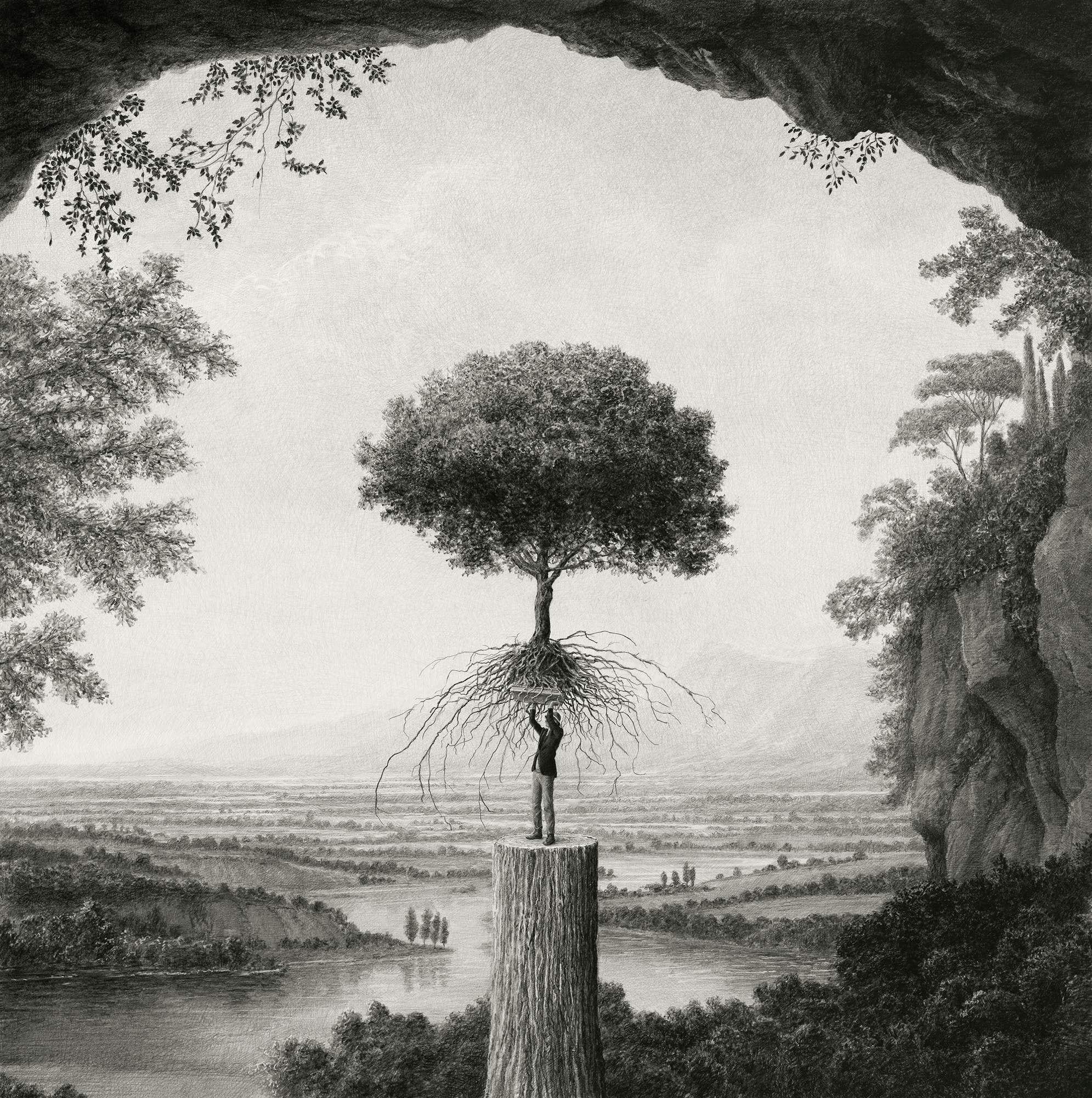 a man standing on a massive tree stump holds a tree above his head. cliffs, forests, and a river are in the background