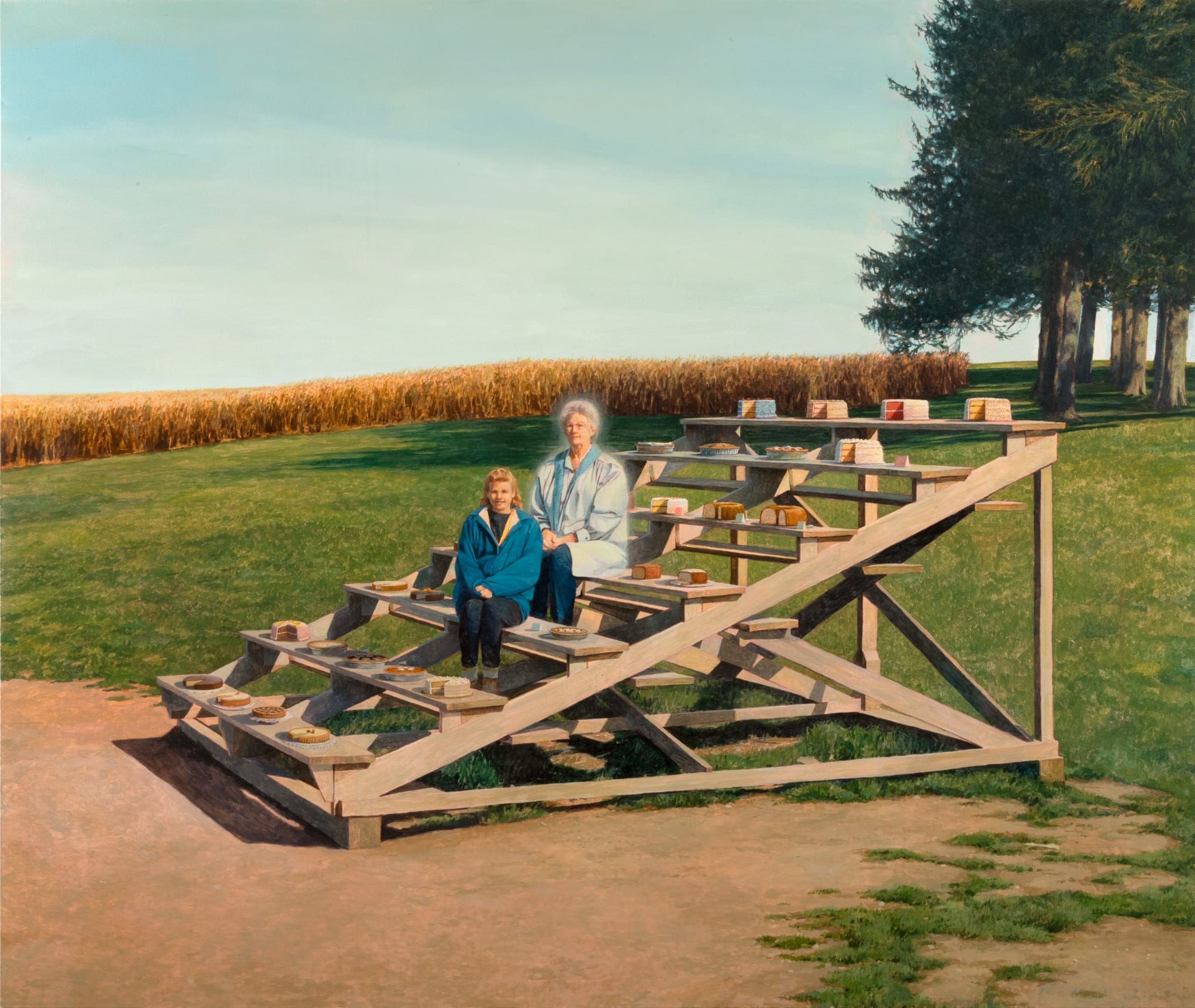 two white women, one younger and one older, sit on a small bleacher outdoors with pies and cakes surrounding them. the older woman appears to glow from behind