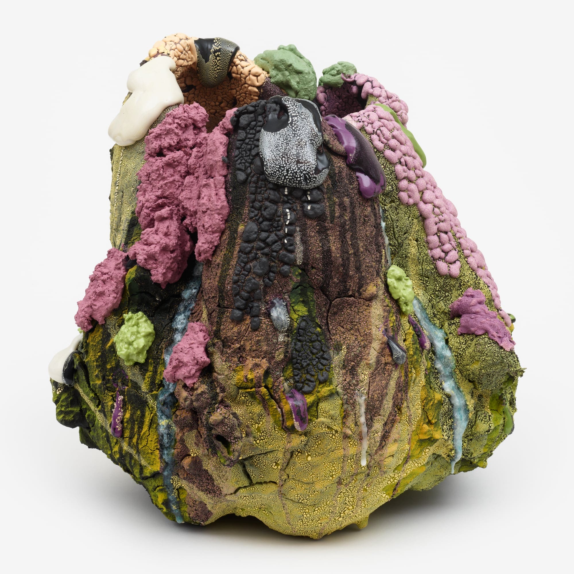 an oval ceramic vessel with gloopy, drippy, chunky, and crackled glaze in pinks, greens, and neutrals