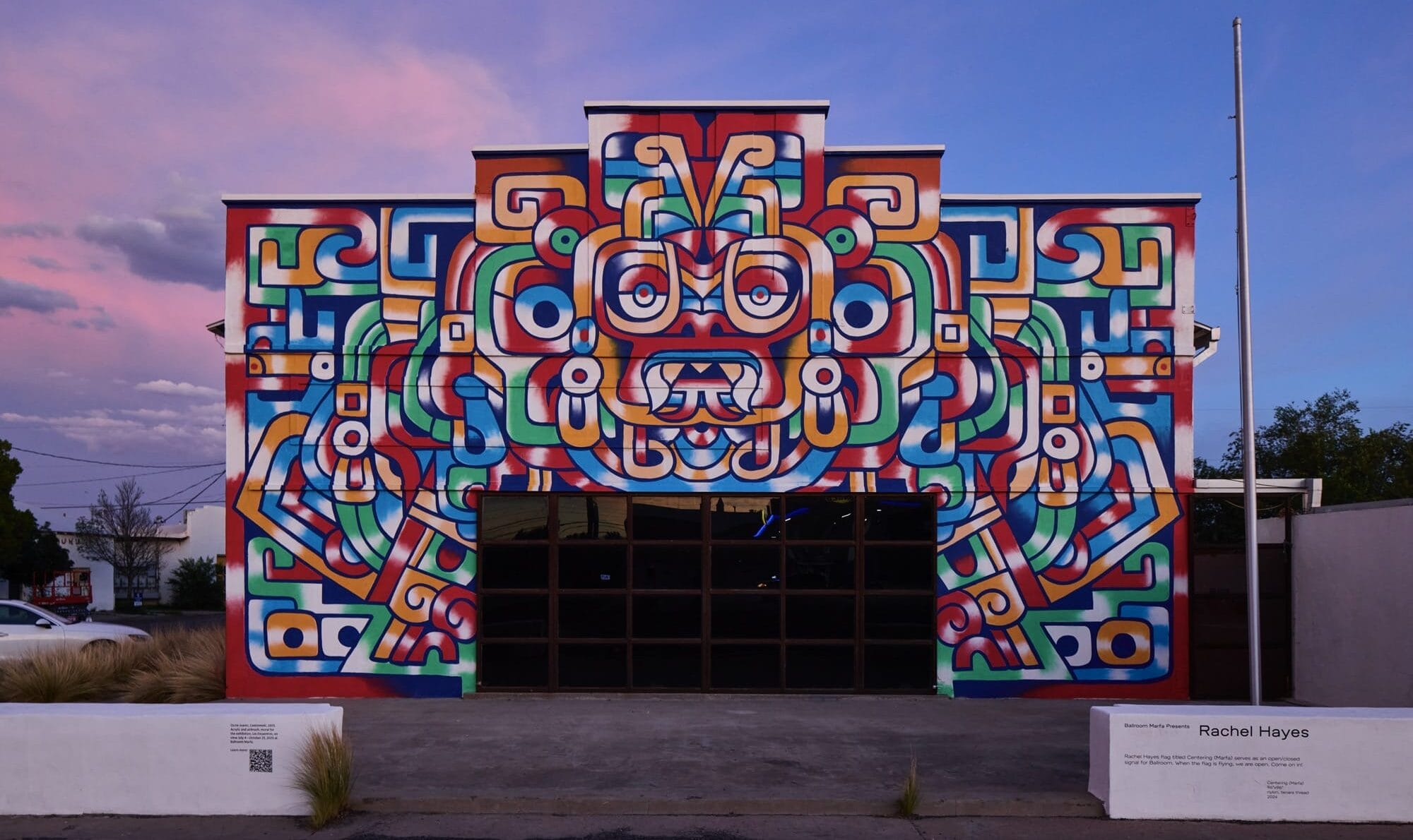 a colorful mural on the facade of Ballroom Marfa