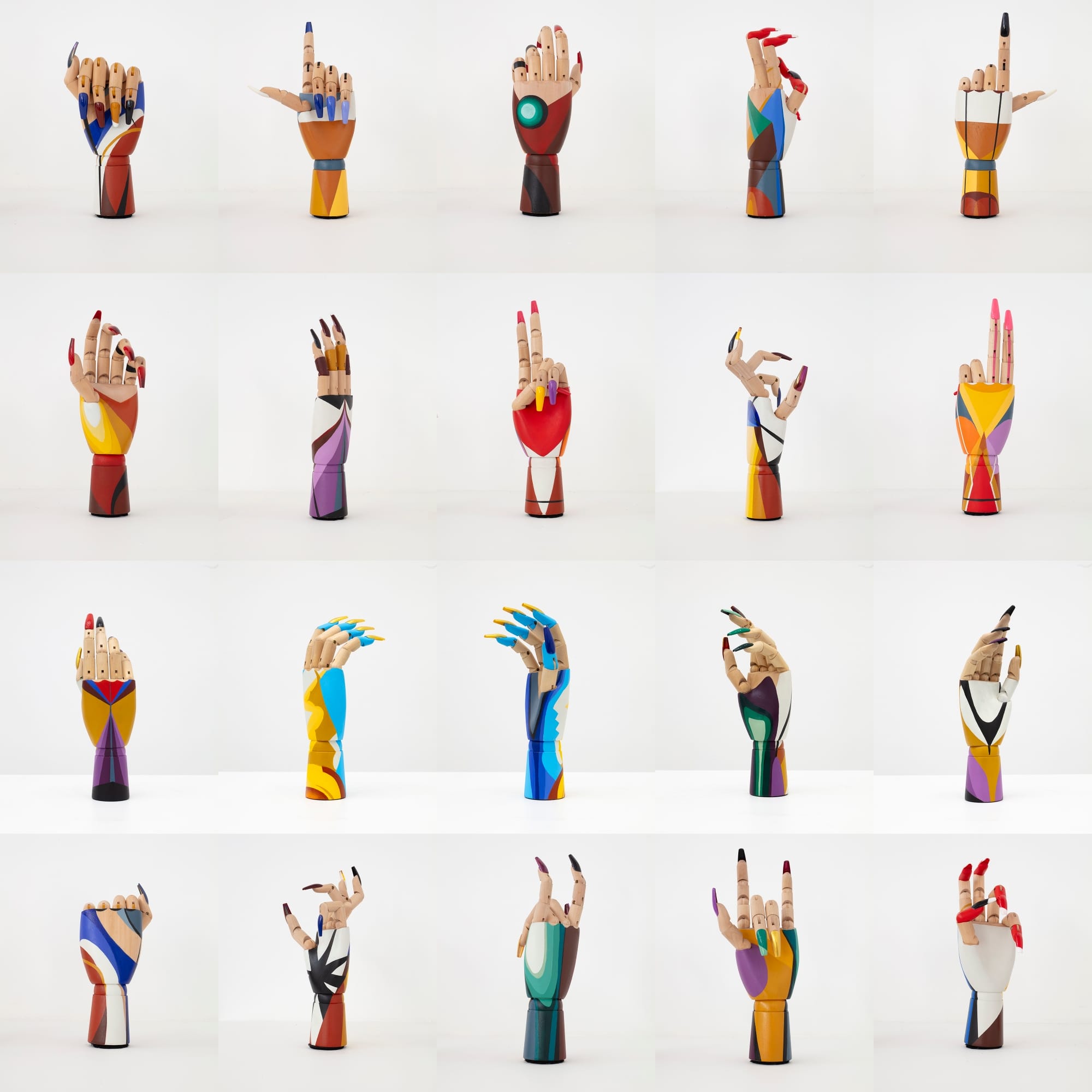 a grid of wooden hand mannequins painted with fake nails