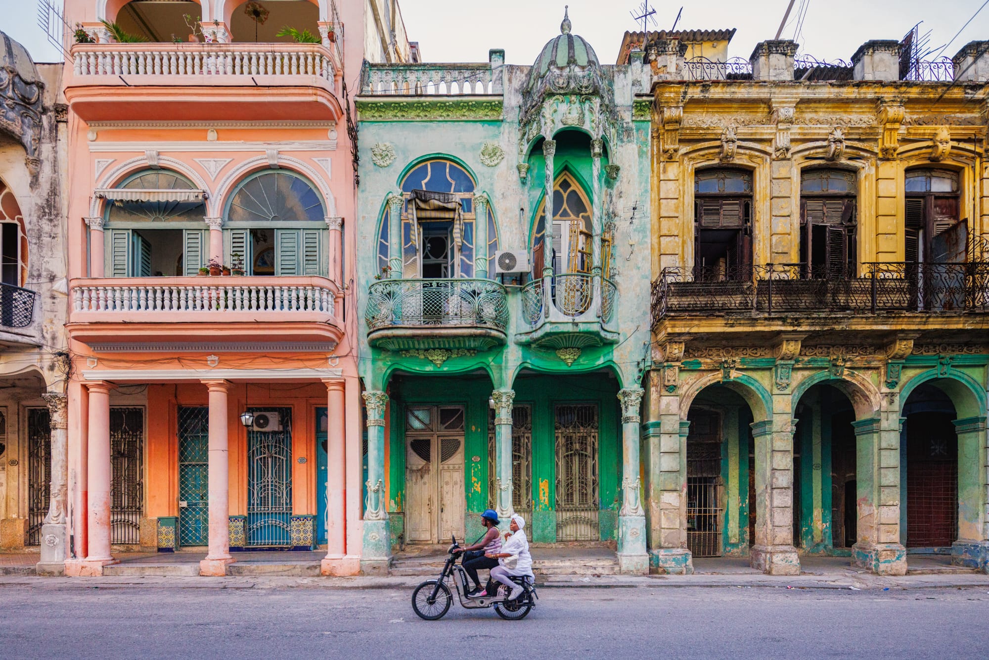 a photograph by James Kerwin of colorful buildings in Cuba