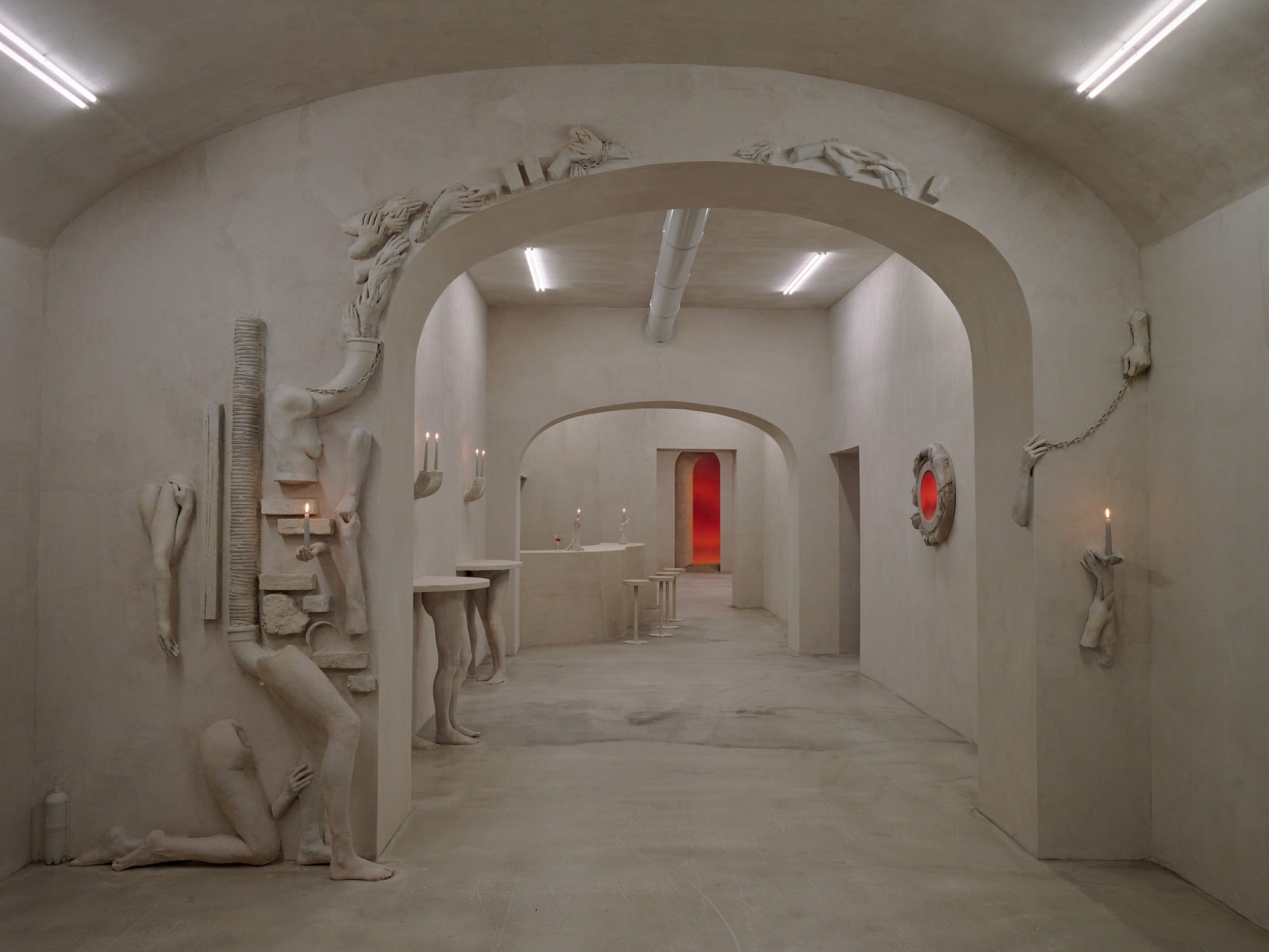 An art installation by Clementine Keith-Roach and Christopher Page that doubles as a bar, with furnishings and decor made of plaster-cast hands