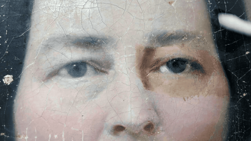 A gif of a portrait being restored