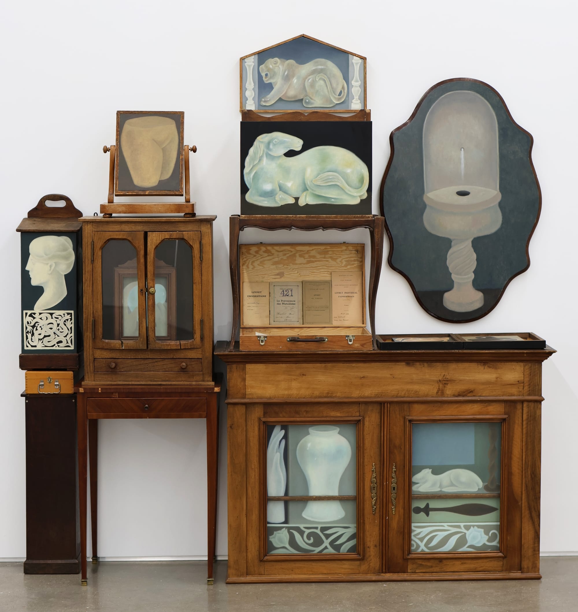 a collection of paintings in wooden furniture by Shuo Hao