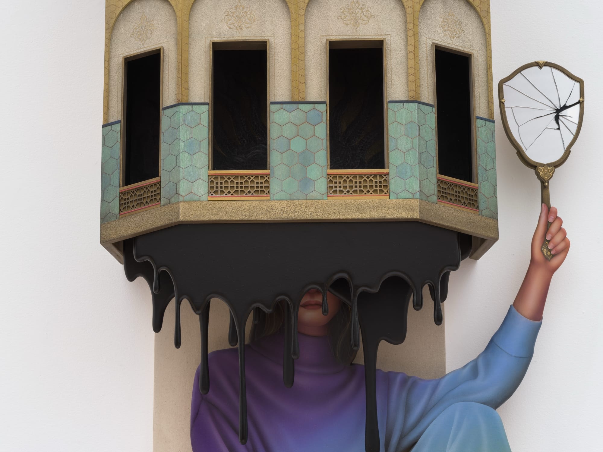 an architectural sculpture of a building dripping black over a woman holding a broken hand mirror